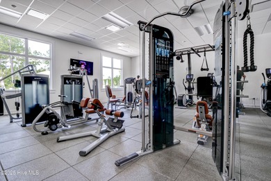 Exquisite home with a view of the pond located in the on Cape Fear National At Brunswick Forest in North Carolina - for sale on GolfHomes.com, golf home, golf lot