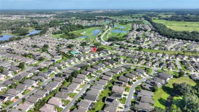 Expanded RidgeCrest with Florida Room has Updated Kitchen, Roof on Ridgewood Lakes Golf and Country Club in Florida - for sale on GolfHomes.com, golf home, golf lot