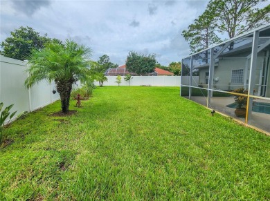 Discover Privacy and luxury in this 4 bedroom/ 3 full bath (plus on The Grand Club - Pine Lakes Course in Florida - for sale on GolfHomes.com, golf home, golf lot