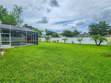 Discover Privacy and luxury in this 4 bedroom/ 3 full bath (plus on The Grand Club - Pine Lakes Course in Florida - for sale on GolfHomes.com, golf home, golf lot