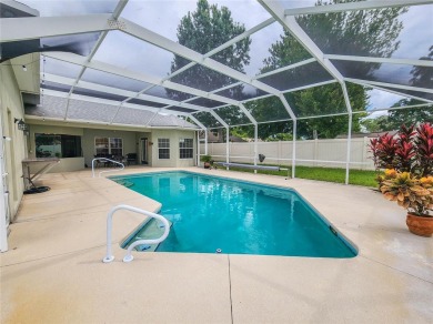 Discover Privacy and luxury in this 4 bedroom/ 3 full bath (plus on The Grand Club - Pine Lakes Course in Florida - for sale on GolfHomes.com, golf home, golf lot