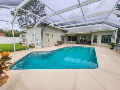 Discover Privacy and luxury in this 4 bedroom/ 3 full bath (plus on The Grand Club - Pine Lakes Course in Florida - for sale on GolfHomes.com, golf home, golf lot