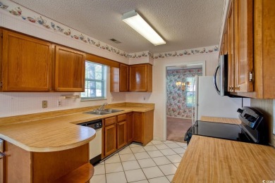 Welcome Home to Southern Charm at the Beach! Nestled in one of on Tupelo Bay Golf Complex  in South Carolina - for sale on GolfHomes.com, golf home, golf lot