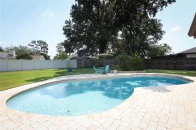 Under contract-accepting backup offers. Charming Traditional on Rio Pinar Golf and Country Club in Florida - for sale on GolfHomes.com, golf home, golf lot