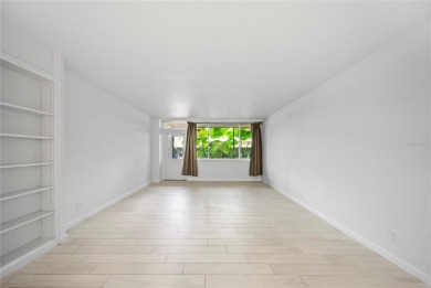 Enjoy ultimate convenience in this beautifully remodeled on Cove Cay Country Club in Florida - for sale on GolfHomes.com, golf home, golf lot