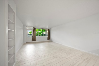 Enjoy ultimate convenience in this beautifully remodeled on Cove Cay Country Club in Florida - for sale on GolfHomes.com, golf home, golf lot