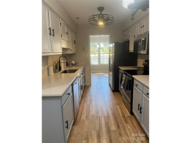 Beautifully Renovated Townhome on the Raintree Golf Course in on Raintree Country Club in North Carolina - for sale on GolfHomes.com, golf home, golf lot