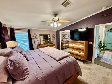 Home is located in Water Oak Country Club Estates in Lady Lake on Water Oak Country Club Estates in Florida - for sale on GolfHomes.com, golf home, golf lot