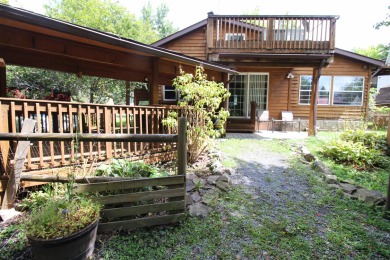 Pipestem Village - Two cabins on 0.22 aces +/-.  The large cabin on Pipestem Golf Club - Regulation in West Virginia - for sale on GolfHomes.com, golf home, golf lot