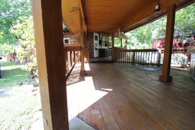 Pipestem Village - Two cabins on 0.22 aces +/-.  The large cabin on Pipestem Golf Club - Regulation in West Virginia - for sale on GolfHomes.com, golf home, golf lot