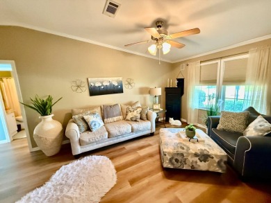 Home is located in Water Oak Country Club Estates in Lady Lake on Water Oak Country Club Estates in Florida - for sale on GolfHomes.com, golf home, golf lot