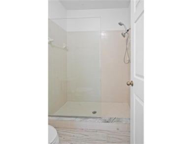 Light and Bright 2BR/2BA condo with Garage and Extra Storage in on Spanish Wells Golf and Country Club in Florida - for sale on GolfHomes.com, golf home, golf lot