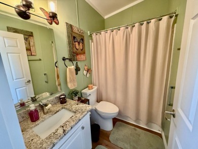 Home is located in Water Oak Country Club Estates in Lady Lake on Water Oak Country Club Estates in Florida - for sale on GolfHomes.com, golf home, golf lot