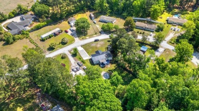 Welcome to 300 Rolling Ridge Dr. in Longs, SC -- a charming on Aberdeen Golf and Country Club in South Carolina - for sale on GolfHomes.com, golf home, golf lot