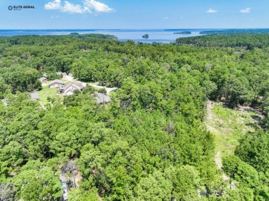 Nestled on the coveted point side of Rayburn country, this on Rayburn Country Club in Texas - for sale on GolfHomes.com, golf home, golf lot