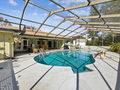 UNIQUE 4 BEDROOM, 3 BATH POOL HOME WITH A GRANDFATHERED IN FENCE on Beacon Woods Golf Club in Florida - for sale on GolfHomes.com, golf home, golf lot