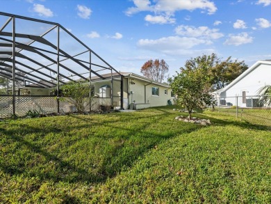 UNIQUE 4 BEDROOM, 3 BATH POOL HOME WITH A GRANDFATHERED IN FENCE on Beacon Woods Golf Club in Florida - for sale on GolfHomes.com, golf home, golf lot