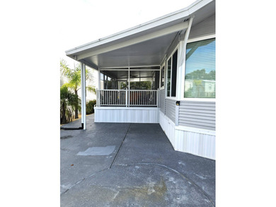 Welcome to 291 Doubles Lane, located in the 55+ Regal Ridge Coop on Deer Creek RV Golf Resort in Florida - for sale on GolfHomes.com, golf home, golf lot