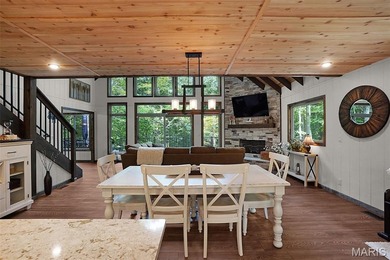 Completed in March 2025, this nearly brand-new chalet features on Innsbrook Resort Golf Course in Missouri - for sale on GolfHomes.com, golf home, golf lot