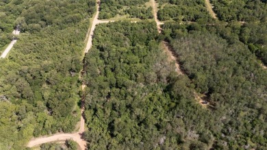 Nice lot in Tahitian Village ready for your personal touch on Pine Forest Golf Club in Texas - for sale on GolfHomes.com, golf home, golf lot