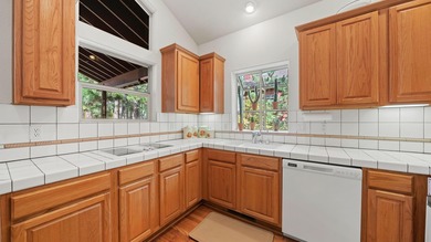 Discover effortless mountain living in this popular single-story on Whitehawk Ranch Golf Club in California - for sale on GolfHomes.com, golf home, golf lot