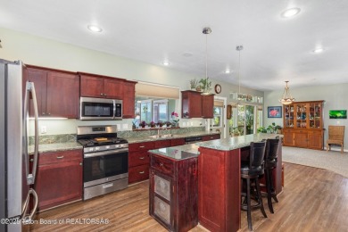 This home is thoughtfully designed to take full advantage of its on Star Valley RV Golf Course in Wyoming - for sale on GolfHomes.com, golf home, golf lot