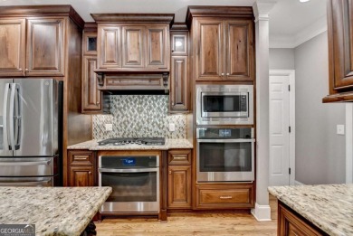 Absolutely stunning 5 bed/4.5 bath MASTER-ON-MAIN home with on Laurel Springs Golf Club in Georgia - for sale on GolfHomes.com, golf home, golf lot