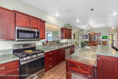 This home is thoughtfully designed to take full advantage of its on Star Valley RV Golf Course in Wyoming - for sale on GolfHomes.com, golf home, golf lot