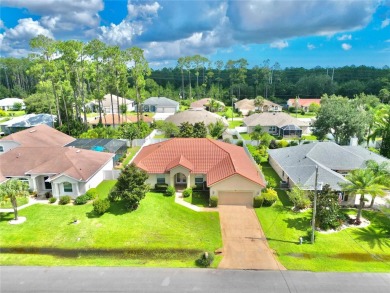 Welcome to your new home in beautiful Palm Coast, Florida! This on The Grand Club Cypress Course in Florida - for sale on GolfHomes.com, golf home, golf lot
