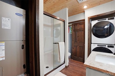 Completed in March 2025, this nearly brand-new chalet features on Innsbrook Resort Golf Course in Missouri - for sale on GolfHomes.com, golf home, golf lot
