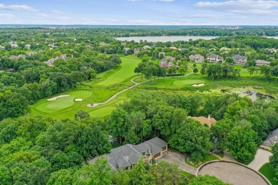 Tucked away at the end of a quiet cul-de-sac, this storybook on Bearpath Golf and Country Club in Minnesota - for sale on GolfHomes.com, golf home, golf lot
