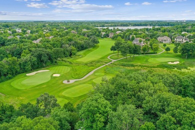 Tucked away at the end of a quiet cul-de-sac, this storybook on Bearpath Golf and Country Club in Minnesota - for sale on GolfHomes.com, golf home, golf lot