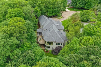 Tucked away at the end of a quiet cul-de-sac, this storybook on Bearpath Golf and Country Club in Minnesota - for sale on GolfHomes.com, golf home, golf lot