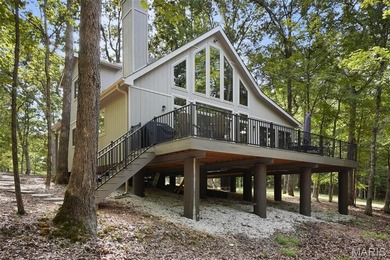 Completed in March 2025, this nearly brand-new chalet features on Innsbrook Resort Golf Course in Missouri - for sale on GolfHomes.com, golf home, golf lot