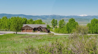 This beautiful, traditional home is designed to take full on Star Valley RV Golf Course in Wyoming - for sale on GolfHomes.com, golf home, golf lot