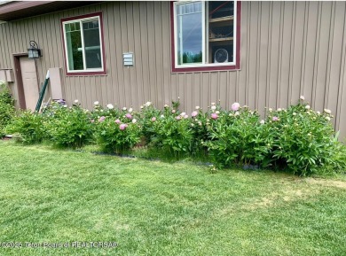 This beautiful, traditional home is designed to take full on Star Valley RV Golf Course in Wyoming - for sale on GolfHomes.com, golf home, golf lot