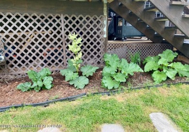 This beautiful, traditional home is designed to take full on Star Valley RV Golf Course in Wyoming - for sale on GolfHomes.com, golf home, golf lot