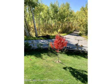 This beautiful, traditional home is designed to take full on Star Valley RV Golf Course in Wyoming - for sale on GolfHomes.com, golf home, golf lot