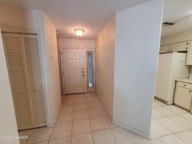 Located in the ST. ANDREWS section of Pelican Bay. Brick on The Club At Pelican Bay - North Course in Florida - for sale on GolfHomes.com, golf home, golf lot