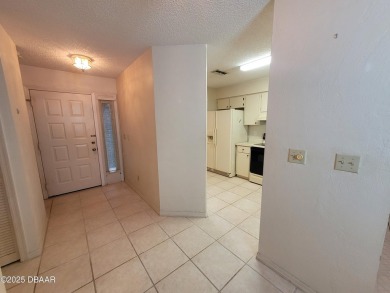 Located in the ST. ANDREWS section of Pelican Bay. Brick on The Club At Pelican Bay - North Course in Florida - for sale on GolfHomes.com, golf home, golf lot