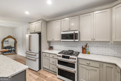 Nestled in the gated community of The Orchard Golf & Country on The Orchard Golf and Country Club in Georgia - for sale on GolfHomes.com, golf home, golf lot