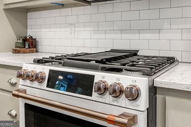 Nestled in the gated community of The Orchard Golf & Country on The Orchard Golf and Country Club in Georgia - for sale on GolfHomes.com, golf home, golf lot