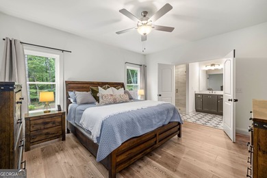 Nestled in the gated community of The Orchard Golf & Country on The Orchard Golf and Country Club in Georgia - for sale on GolfHomes.com, golf home, golf lot