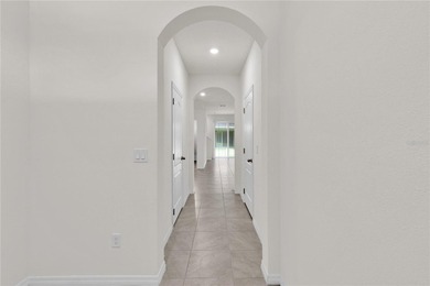 Some homes simply feel right the moment you arrive. That is on Ridgewood Lakes Golf and Country Club in Florida - for sale on GolfHomes.com, golf home, golf lot