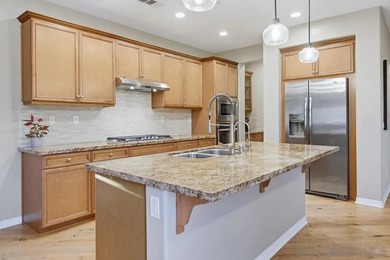 This stunning former model home, built by Michael Gregory on Skyline Ranch Country Club in California - for sale on GolfHomes.com, golf home, golf lot