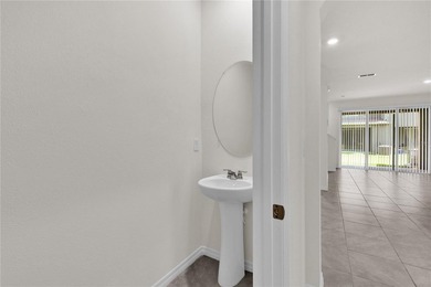 Some homes simply feel right the moment you arrive. That is on Ridgewood Lakes Golf and Country Club in Florida - for sale on GolfHomes.com, golf home, golf lot