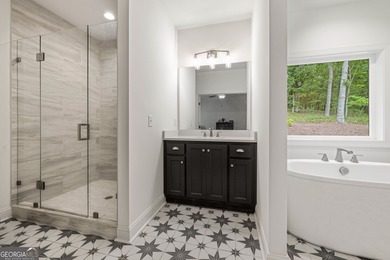 Nestled in the gated community of The Orchard Golf & Country on The Orchard Golf and Country Club in Georgia - for sale on GolfHomes.com, golf home, golf lot