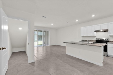 Some homes simply feel right the moment you arrive. That is on Ridgewood Lakes Golf and Country Club in Florida - for sale on GolfHomes.com, golf home, golf lot