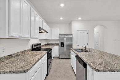 Some homes simply feel right the moment you arrive. That is on Ridgewood Lakes Golf and Country Club in Florida - for sale on GolfHomes.com, golf home, golf lot