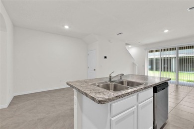 Some homes simply feel right the moment you arrive. That is on Ridgewood Lakes Golf and Country Club in Florida - for sale on GolfHomes.com, golf home, golf lot